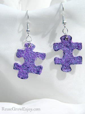 Purple glitter puzzle-piece earrings