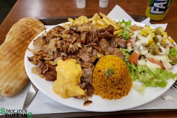 Chicken and rice meal with bread roll